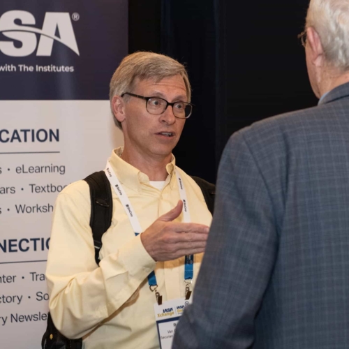 Attendees discussing topics at the IASA Conference. Photo by WDO Photography Atlanta